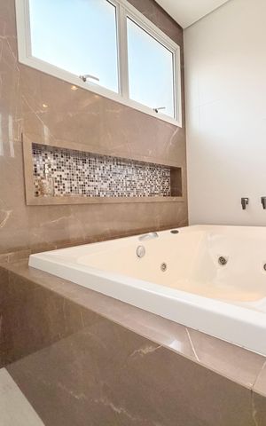 Casa de condomínio à venda com 329m², 3 quartos e 3 vagasBanheiro da Suíte
