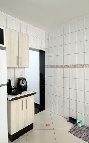 Casa à venda com 76m², 2 quartos e 2 vagas Casa à venda com 76m², 2 quartos e 2 vagasCozinha