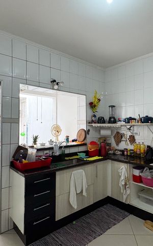 Casa à venda com 76m², 2 quartos e 2 vagas Casa à venda com 76m², 2 quartos e 2 vagasCozinha