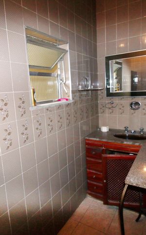 Casa à venda com 230m², 4 quartos e 3 vagasBanheiro da Suíte 2