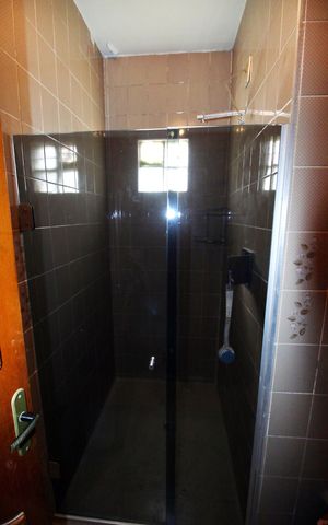 Casa à venda com 230m², 4 quartos e 3 vagasBanheiro da Suíte 2