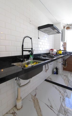 Apartamento à venda com 46m², 2 quartos e sem vaga Apartamento à venda com 46m², 2 quartos e sem vagaCozinha e Área de Serviço