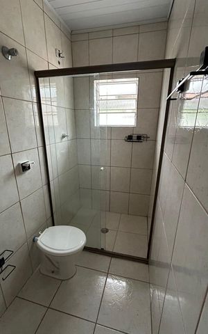 Casa à venda com 70m², 3 quartos e 1 vaga Casa à venda com 70m², 3 quartos e 1 vagaBanheiro