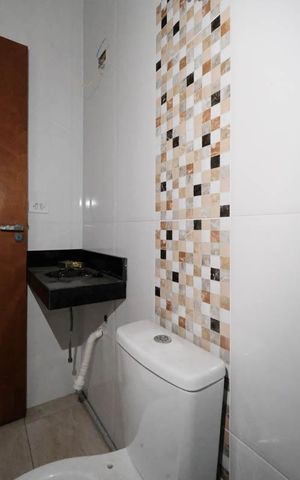 Casa à venda com 132m², 3 quartos e 2 vagasBanheiro
