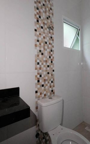 Casa à venda com 132m², 3 quartos e 2 vagasBanheiro