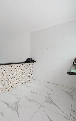 Casa à venda com 132m², 3 quartos e 2 vagasCozinha e Área de Serviço