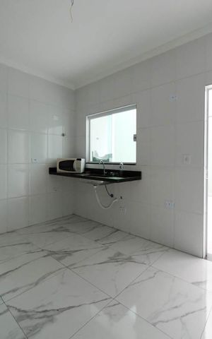 Casa à venda com 132m², 3 quartos e 2 vagasCozinha e Área de Serviço
