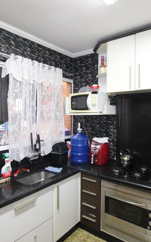 Casa de condomínio à venda com 130m², 2 quartos e 1 vagaCozinha