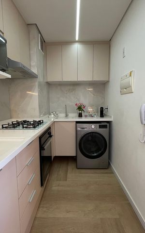 Apartamento à venda com 40m², 2 quartos e 1 vaga Apartamento à venda com 40m², 2 quartos e 1 vagaCozinha e Área de Serviço