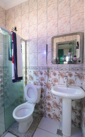 Casa à venda com 450m², 4 quartos e 7 vagasBanheiro da Suite 2