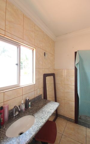 Casa à venda com 450m², 4 quartos e 7 vagasBanheiro da Suite 1