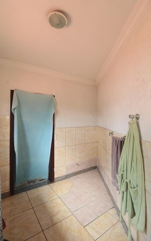 Casa à venda com 450m², 4 quartos e 7 vagasBanheiro da Suite 1