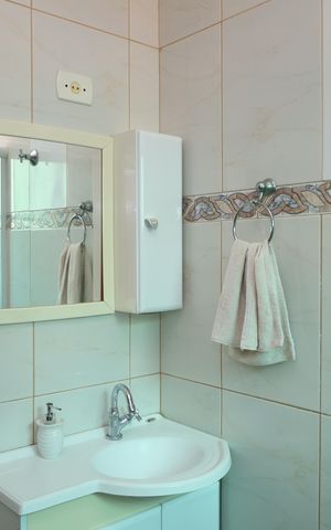 Casa à venda com 93m², 2 quartos e 2 vagasBanheiro 1 - Suíte 1