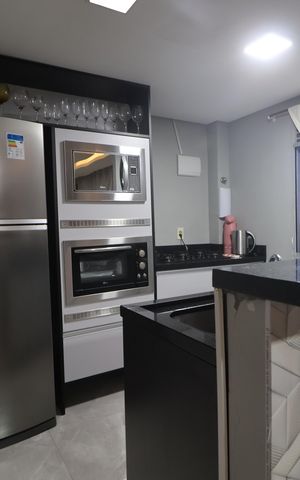 Apartamento à venda com 50m², 2 quartos e 1 vagaCozinha e Área de Serviço