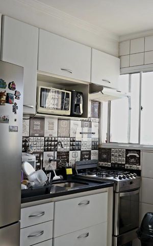 Apartamento à venda com 48m², 2 quartos e 1 vaga Apartamento à venda com 48m², 2 quartos e 1 vagaCozinha