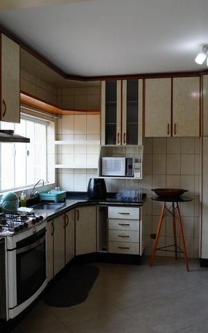 Casa de condomínio para alugar com 600m², 5 quartos e 6 vagasCozinha e Área de Serviço