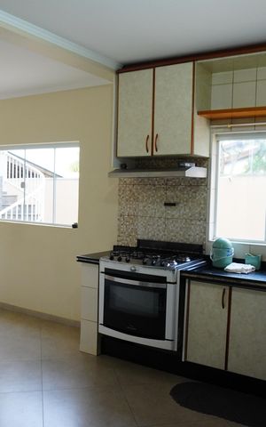 Casa de condomínio para alugar com 600m², 5 quartos e 6 vagasCozinha e Área de Serviço