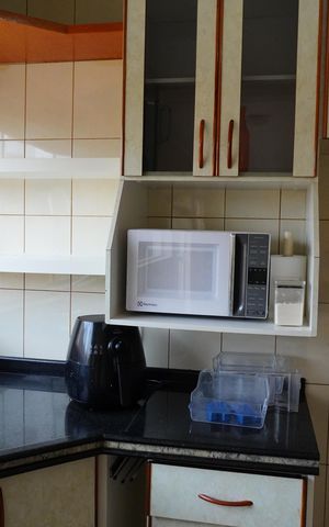 Casa de condomínio para alugar com 600m², 5 quartos e 6 vagasCozinha e Área de Serviço