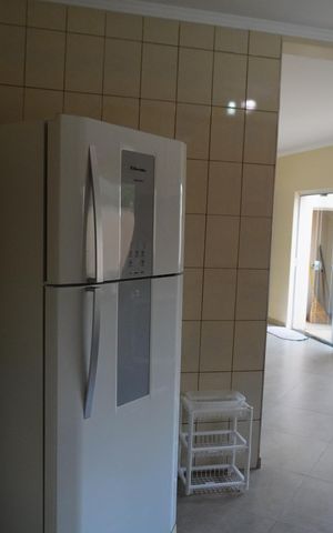 Casa de condomínio para alugar com 600m², 5 quartos e 6 vagasCozinha e Área de Serviço