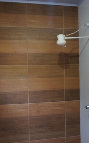 Casa de condomínio para alugar com 600m², 5 quartos e 6 vagasBanheiro da Serviço 2