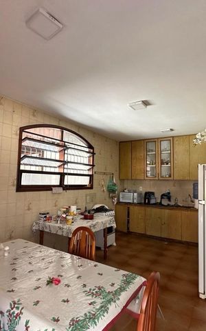 Casa de condomínio à venda com 460m², 4 quartos e 4 vagas Casa de condomínio à venda com 460m², 4 quartos e 4 vagasCozinha