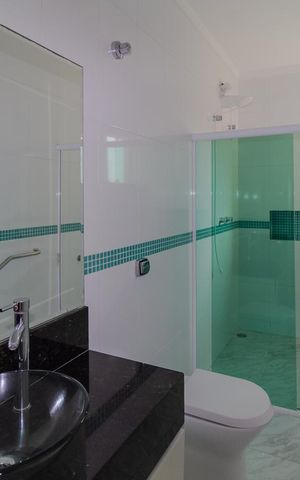 Casa à venda com 120m², 2 quartos e 2 vagas Casa à venda com 120m², 2 quartos e 2 vagasBanheiro da Suíte 1