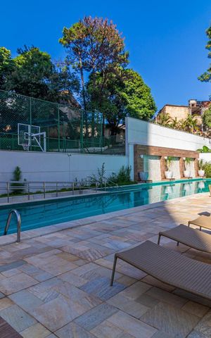 Apartamento à venda com 65m², 2 quartos e 1 vaga Apartamento à venda com 65m², 2 quartos e 1 vagaPiscina com deck e churrasqueira ao lado, cercada por árvores e edifícios na área ao redor.