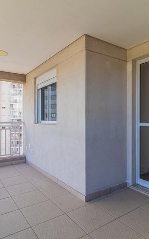 Apartamento à venda com 65m², 2 quartos e 1 vaga Apartamento à venda com 65m², 2 quartos e 1 vagaVaranda com vista para a cidade, com piso de cerâmica e janelas grandes.