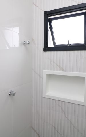 Casa à venda com 80m², 2 quartos e 2 vagasBanheiro da Suíte 2