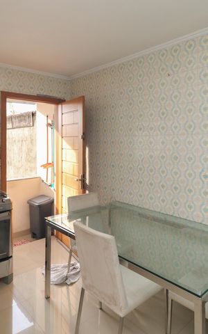 Casa à venda com 103m², 2 quartos e 2 vagas Casa à venda com 103m², 2 quartos e 2 vagasCozinha