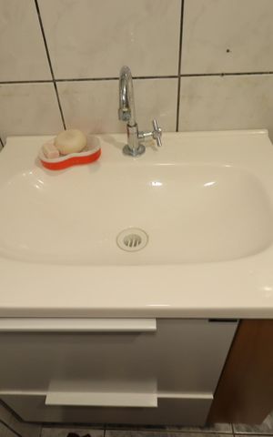 Casa à venda com 138m², 4 quartos e 2 vagasBanheiro 1 da Casa 1 - Pia