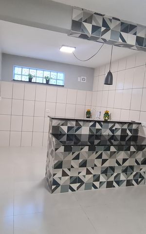 Casa à venda com 100m², 3 quartos e 2 vagas Casa à venda com 100m², 3 quartos e 2 vagasCozinha
