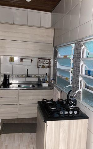 Casa à venda com 130m², 3 quartos e 2 vagas Casa à venda com 130m², 3 quartos e 2 vagasCozinha