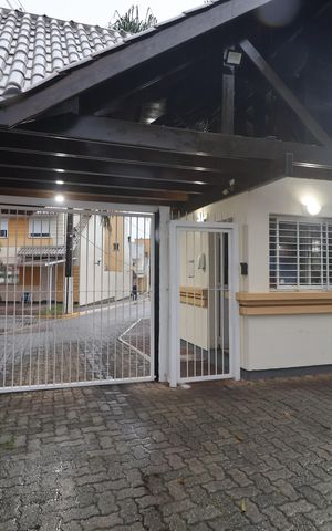 Casa de condomínio à venda com 134m², 3 quartos e 2 vagasFachada e portaria