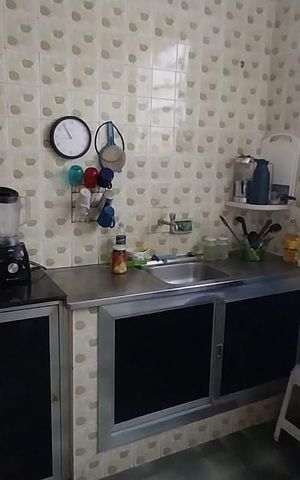 Casa à venda com 98m², 2 quartos e 2 vagas Casa à venda com 98m², 2 quartos e 2 vagasCozinha