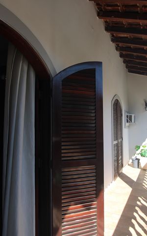 Casa de condomínio à venda com 162m², 3 quartos e 3 vagasQuarto 1 - Varanda que se comunica com a suíte