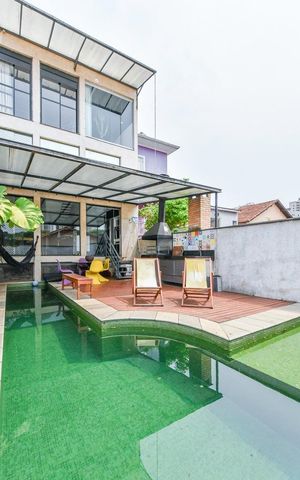 Casa à venda com 400m², 4 quartos e 2 vagas Casa à venda com 400m², 4 quartos e 2 vagasÁrea externa