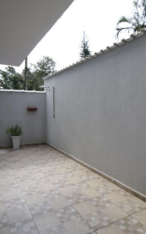 Casa de condomínio à venda com 170m², 2 quartos e 1 vagaQuintal