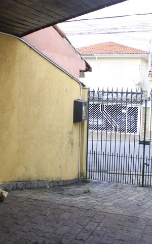 Casa à venda com 250m², 3 quartos e 3 vagasFachada e garagem