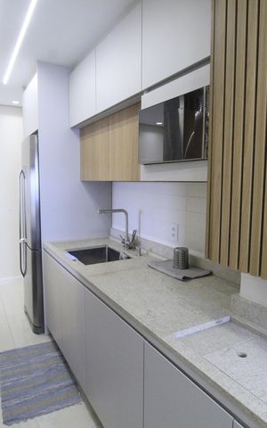 Apartamento à venda com 60m², 2 quartos e 1 vagaCozinha e Área de Serviço