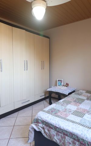 Casa à venda com 257m², 6 quartos e 2 vagasQuarto1 da casa 2