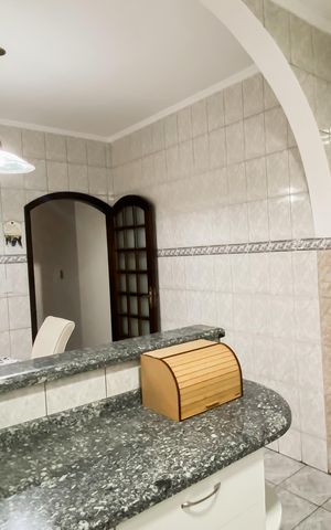 Casa à venda com 145m², 3 quartos e 2 vagas Casa à venda com 145m², 3 quartos e 2 vagasCozinha