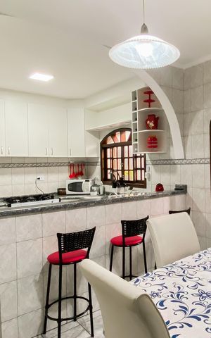 Casa à venda com 145m², 3 quartos e 2 vagas Casa à venda com 145m², 3 quartos e 2 vagasCozinha