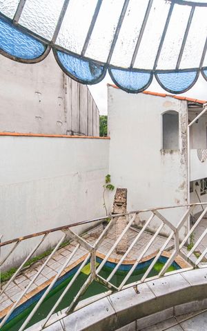 Casa à venda com 340m², 5 quartos e 7 vagas Casa à venda com 340m², 5 quartos e 7 vagasVaranda do Quarto 1