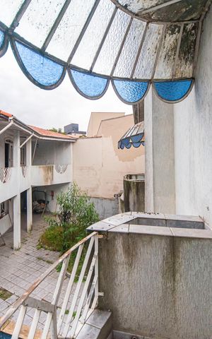 Casa à venda com 340m², 5 quartos e 7 vagas Casa à venda com 340m², 5 quartos e 7 vagasVaranda do Quarto 1