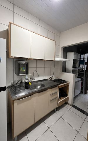 Casa à venda com 45m², 2 quartos e 2 vagas Casa à venda com 45m², 2 quartos e 2 vagasCozinha