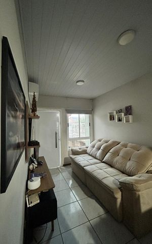 Casa à venda com 45m², 2 quartos e 2 vagas Casa à venda com 45m², 2 quartos e 2 vagasSala