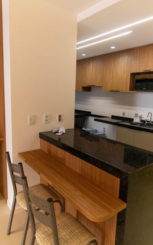 Apartamento à venda com 99m², 2 quartos e 2 vagas Apartamento à venda com 99m², 2 quartos e 2 vagasCozinha e Área de Serviço