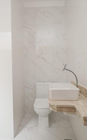 Casa à venda com 122m², 3 quartos e 2 vagasBanheiro da Suíte 2