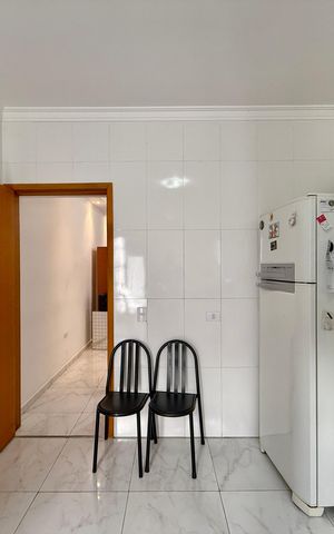 Casa à venda com 101m², 3 quartos e 2 vagas Casa à venda com 101m², 3 quartos e 2 vagasCozinha